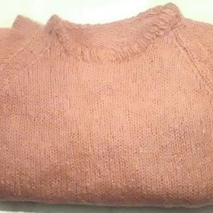 Hand-knit pink sweater and skirt